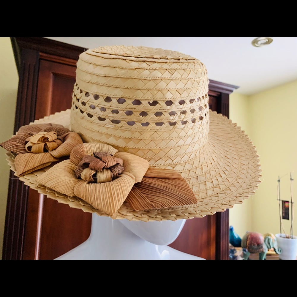 Beautiful real straw summer hat with large flower shaped straw accents over brim
